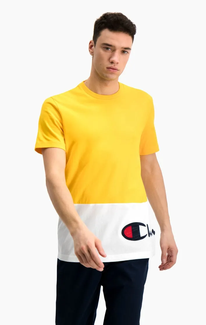CAMISETA MANGA CORTA CHAMPION HOMBRE CUELLO REDONDO COLOUR BLOCK WRAPAROUND LOGO TSHIRT REF. 214363 AMARILLA Y BLANCA LOGO PART