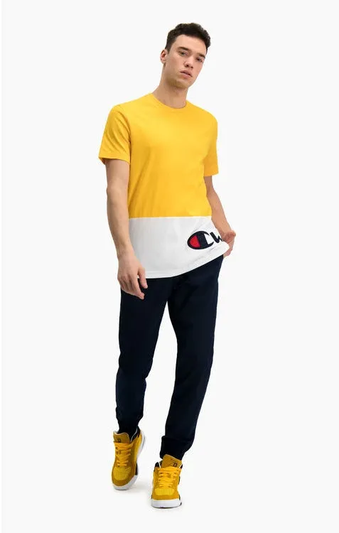CAMISETA MANGA CORTA CHAMPION HOMBRE CUELLO REDONDO COLOUR BLOCK WRAPAROUND LOGO TSHIRT REF. 214363 AMARILLA Y BLANCA LOGO PART
